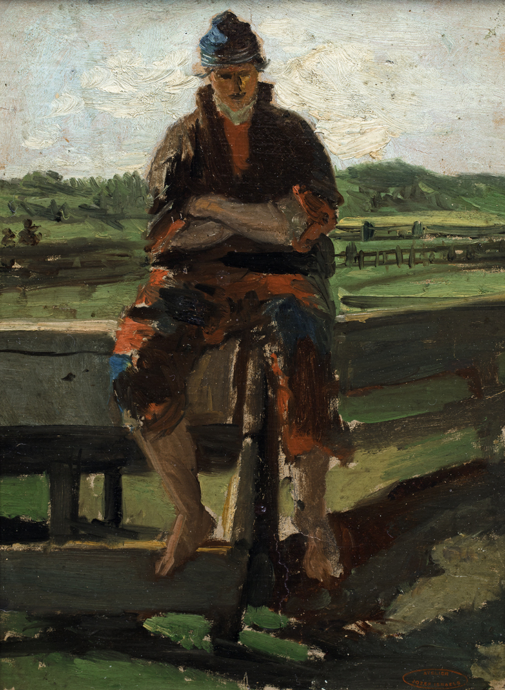 Op hek zittende jongen